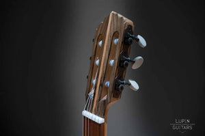 Walnut classical guitar headstock diagonal view