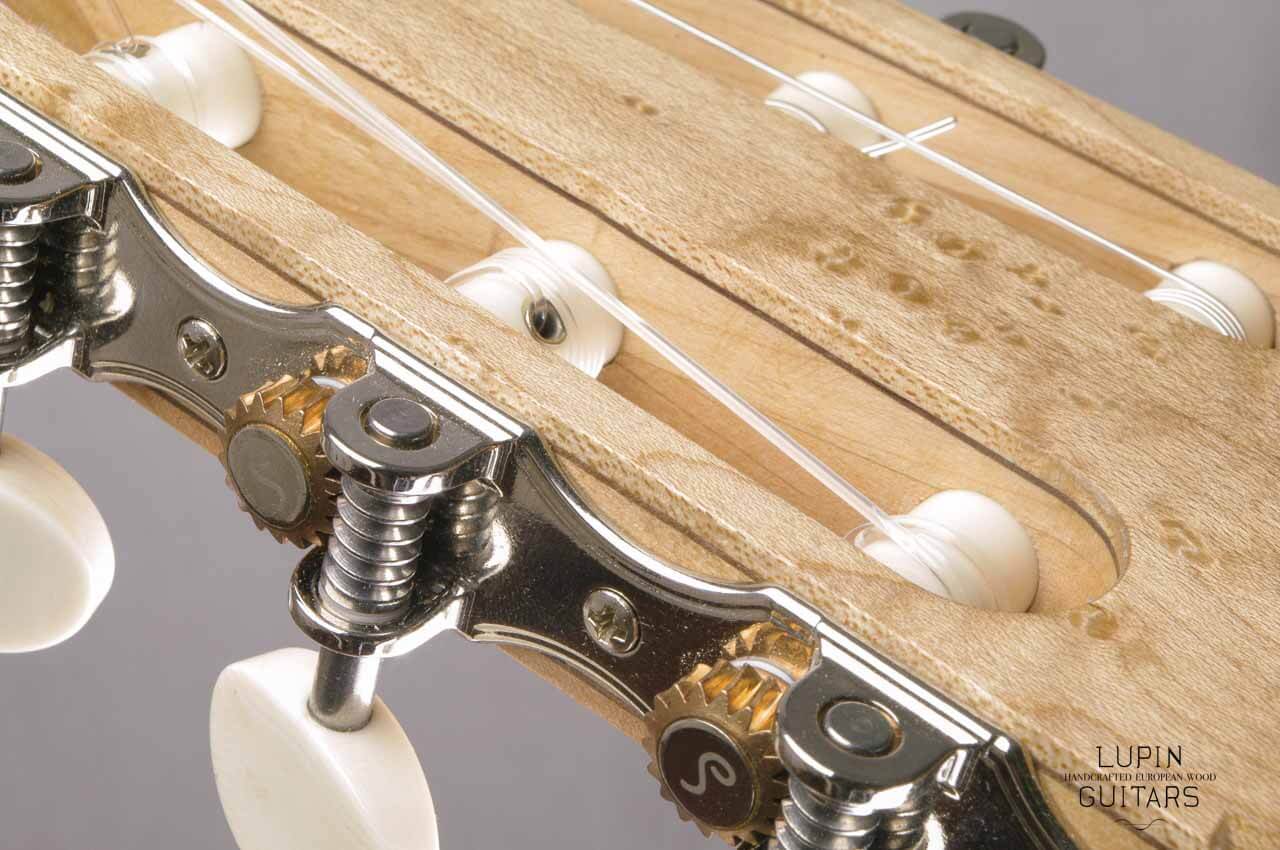 Birds eye maple classical guitar headstock in detail