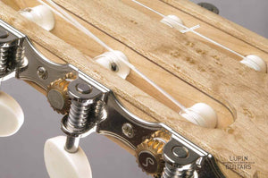 Birds eye maple classical guitar headstock in detail