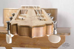 Birds eye maple classical guitar headstock front view