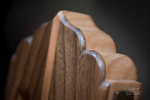 Walnut classical guitar headstock in detail