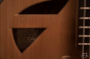 Steel string red cedar sound port