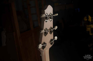 Steel string headstock back